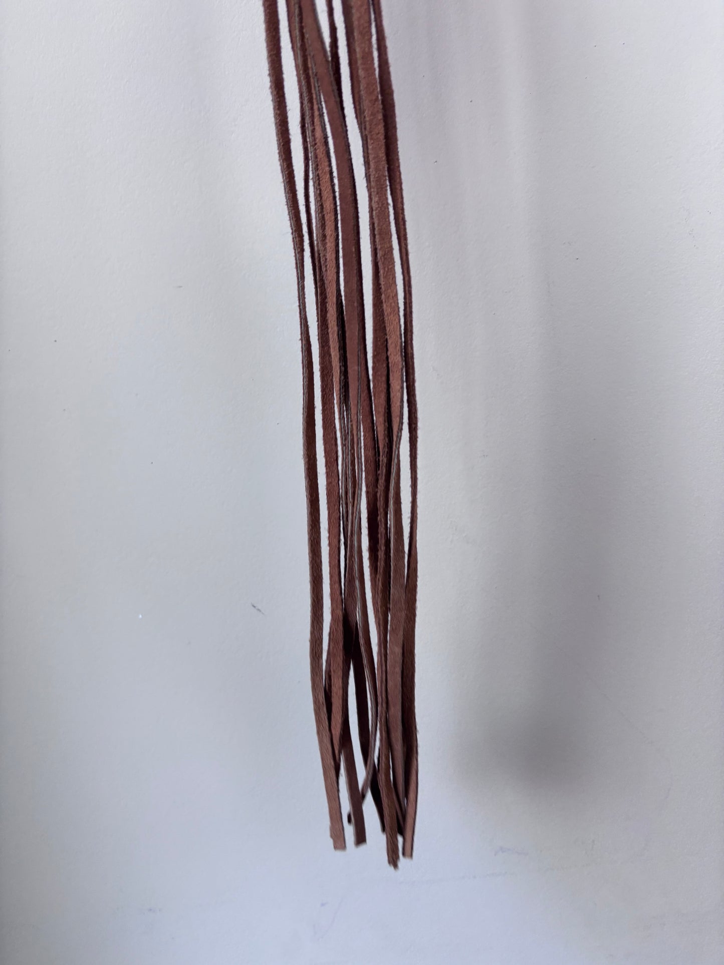 Brown suede stuffed tassel belt