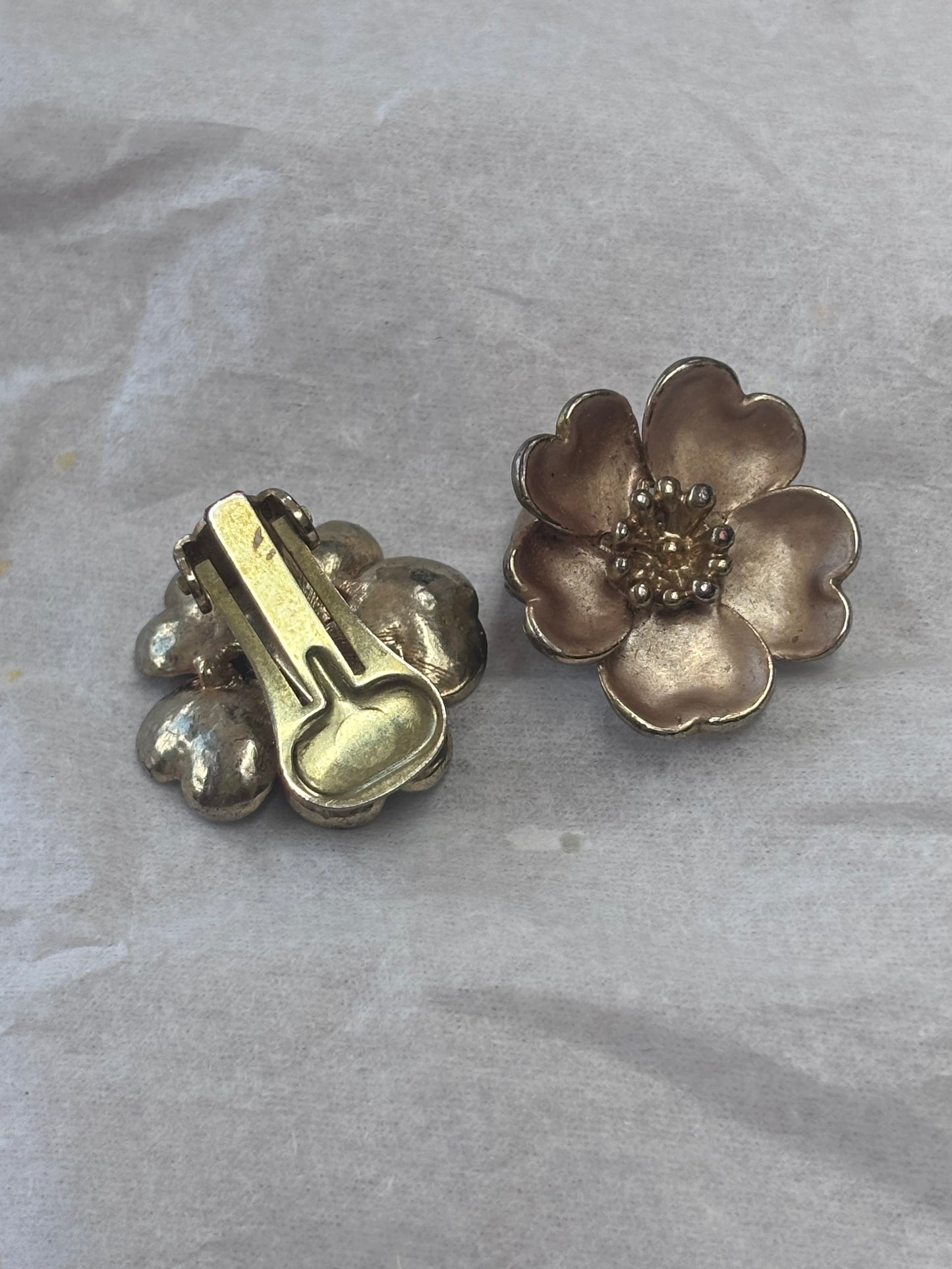 Gold flower clip on earrings