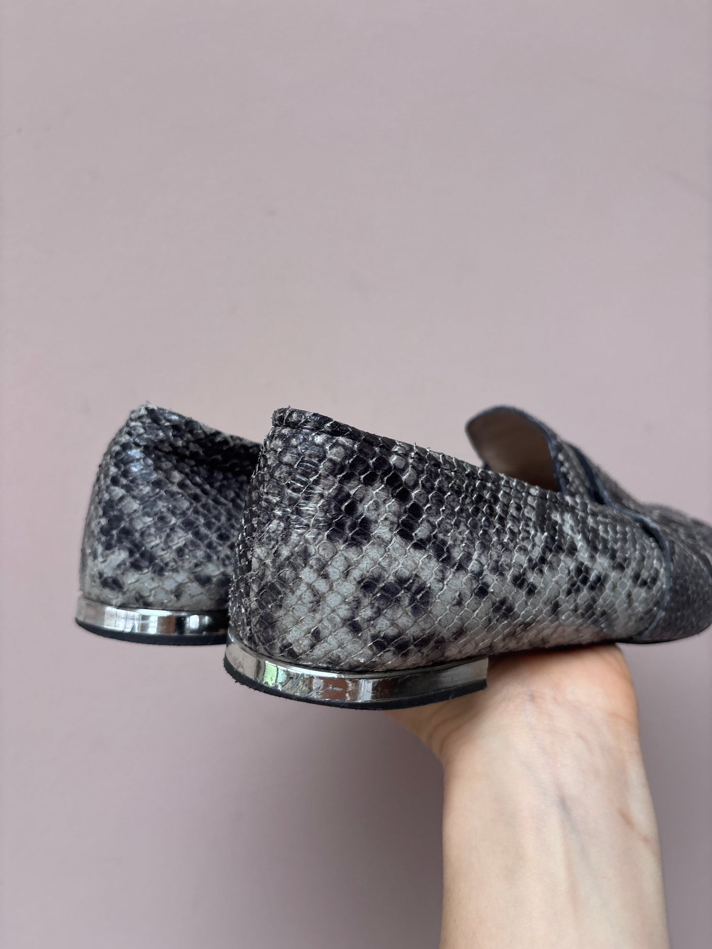 Animal print leather flats size 5