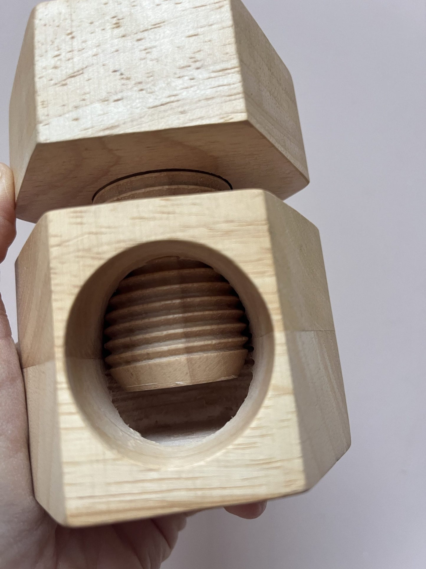 Wooden twist nut cracker