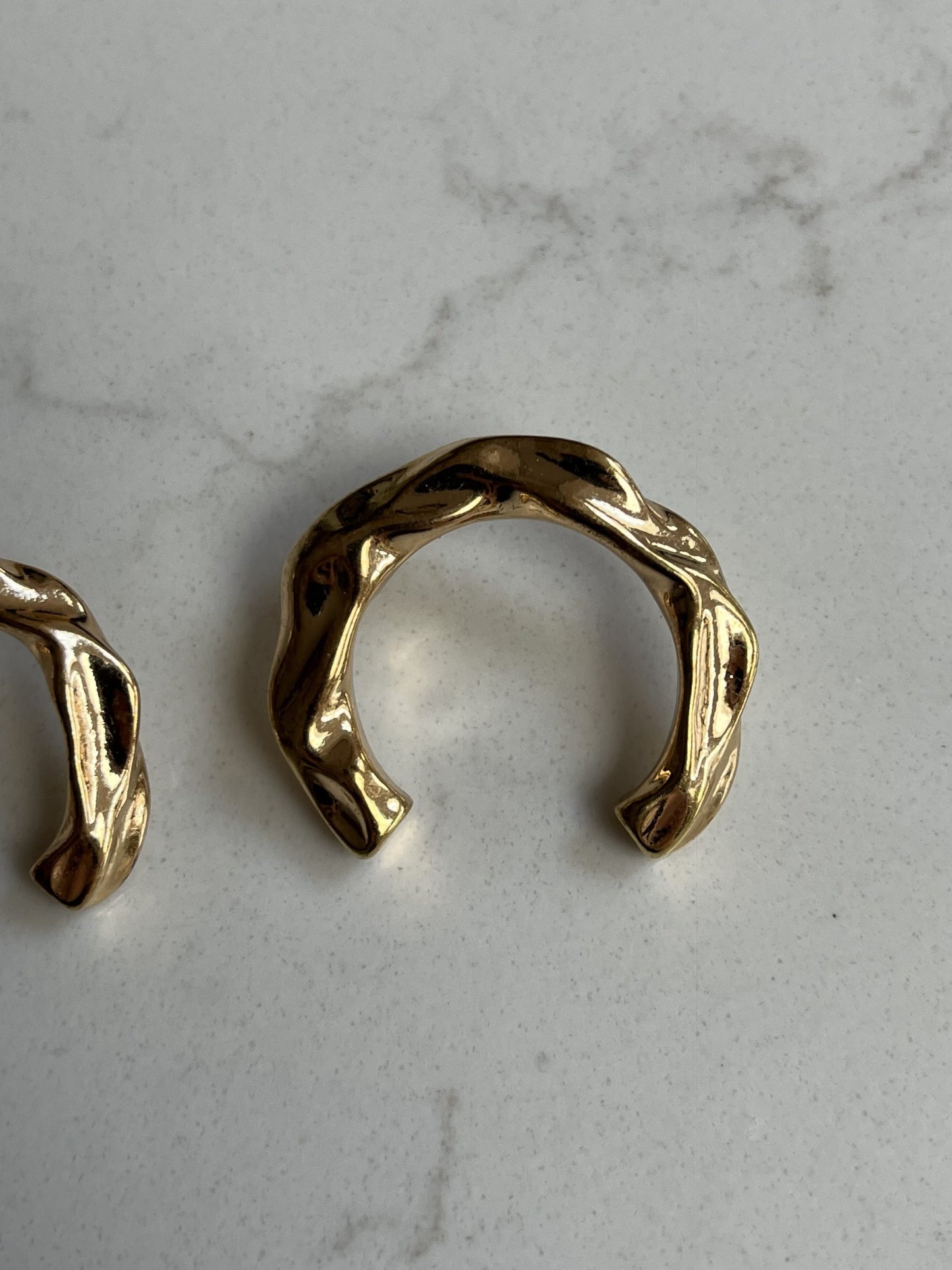 Gold horseshoe earrings