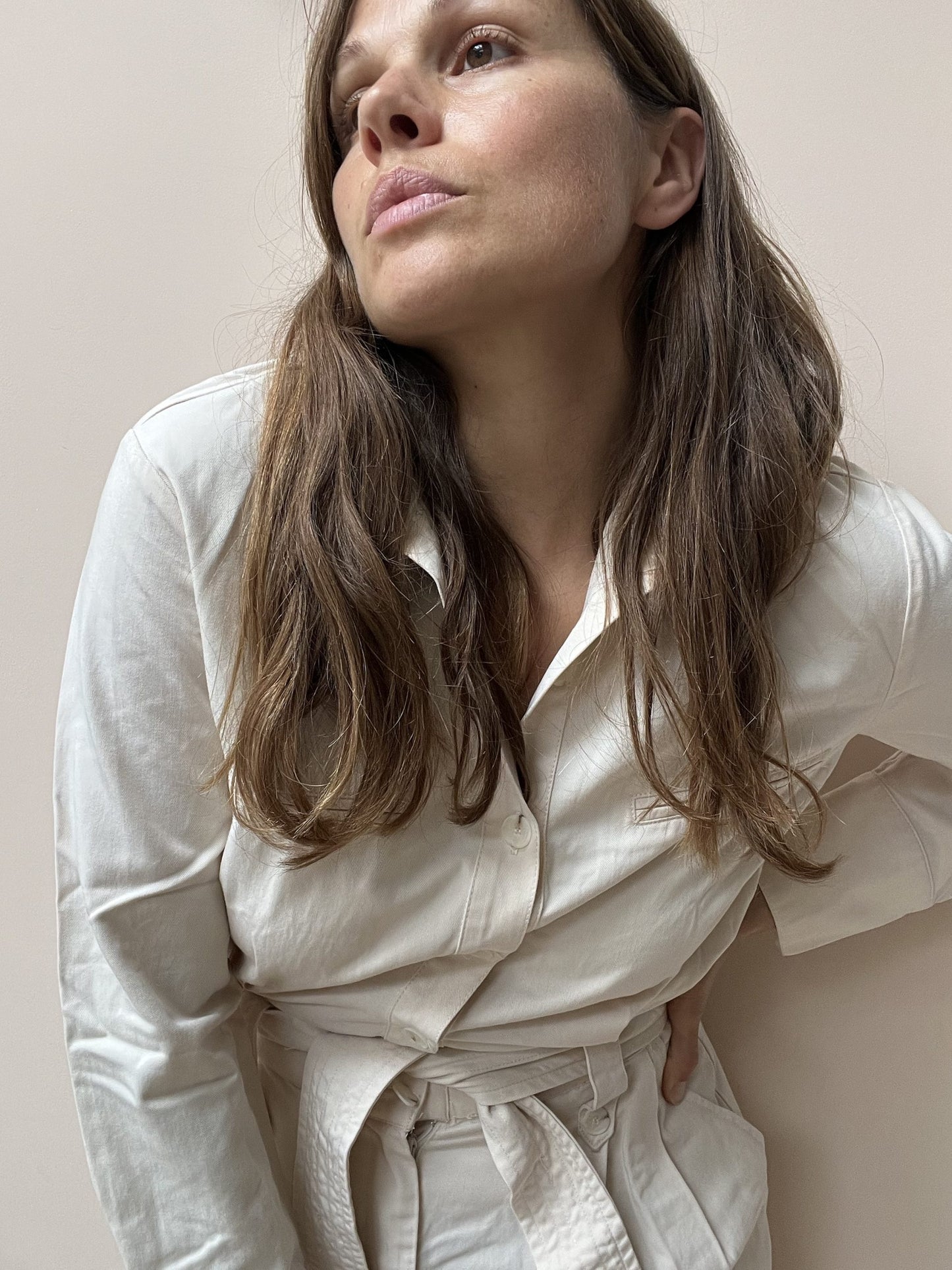 Cream jumpsuit with tie waist size M