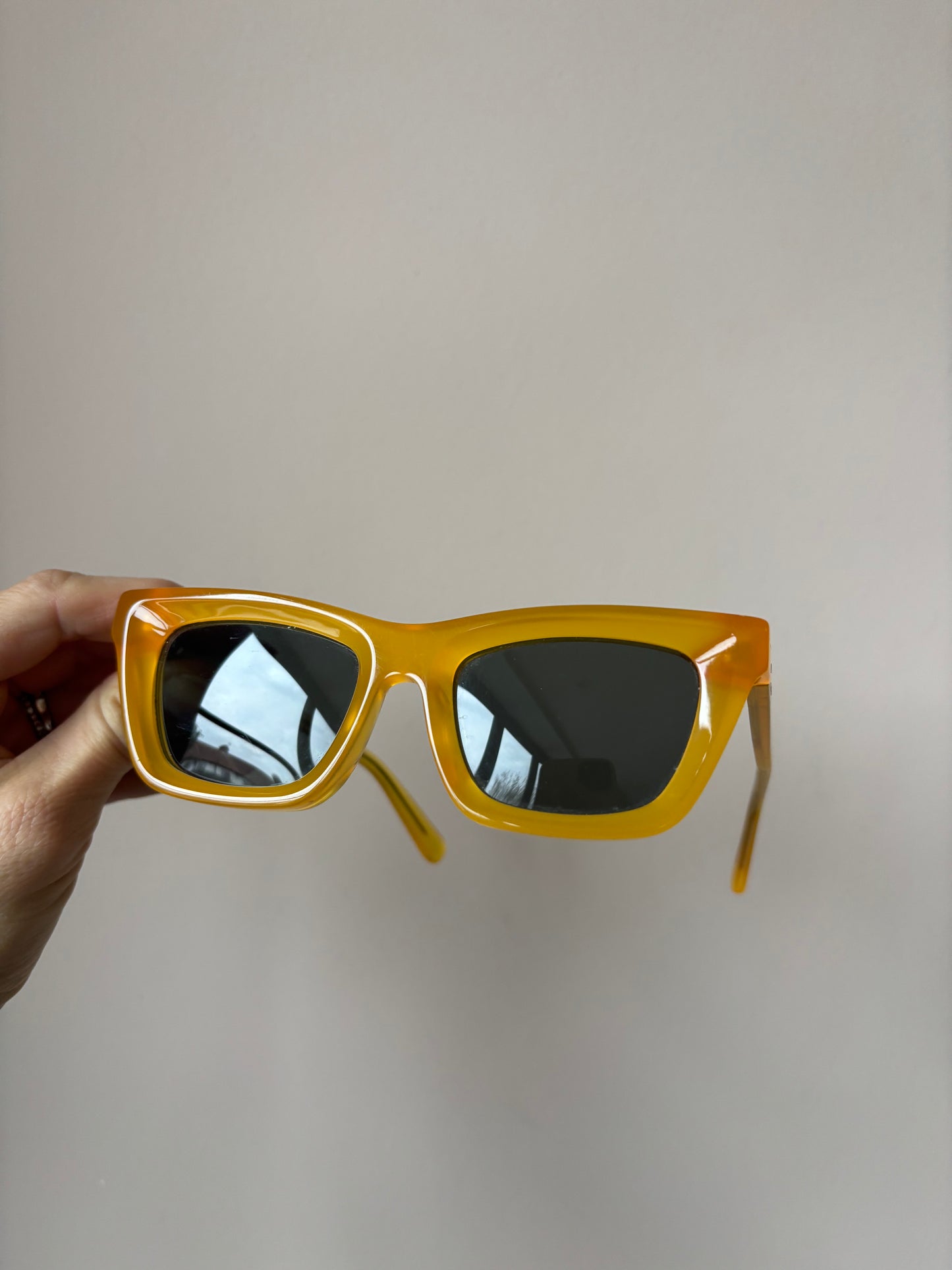 Yellow orange frame sunglasses
