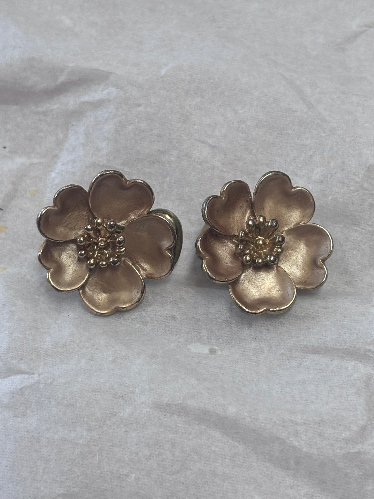 Gold flower clip on earrings