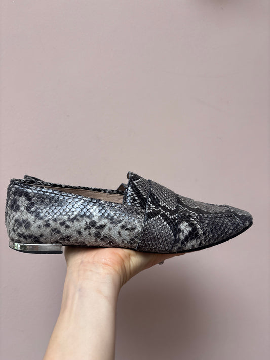 Animal print leather flats size 5