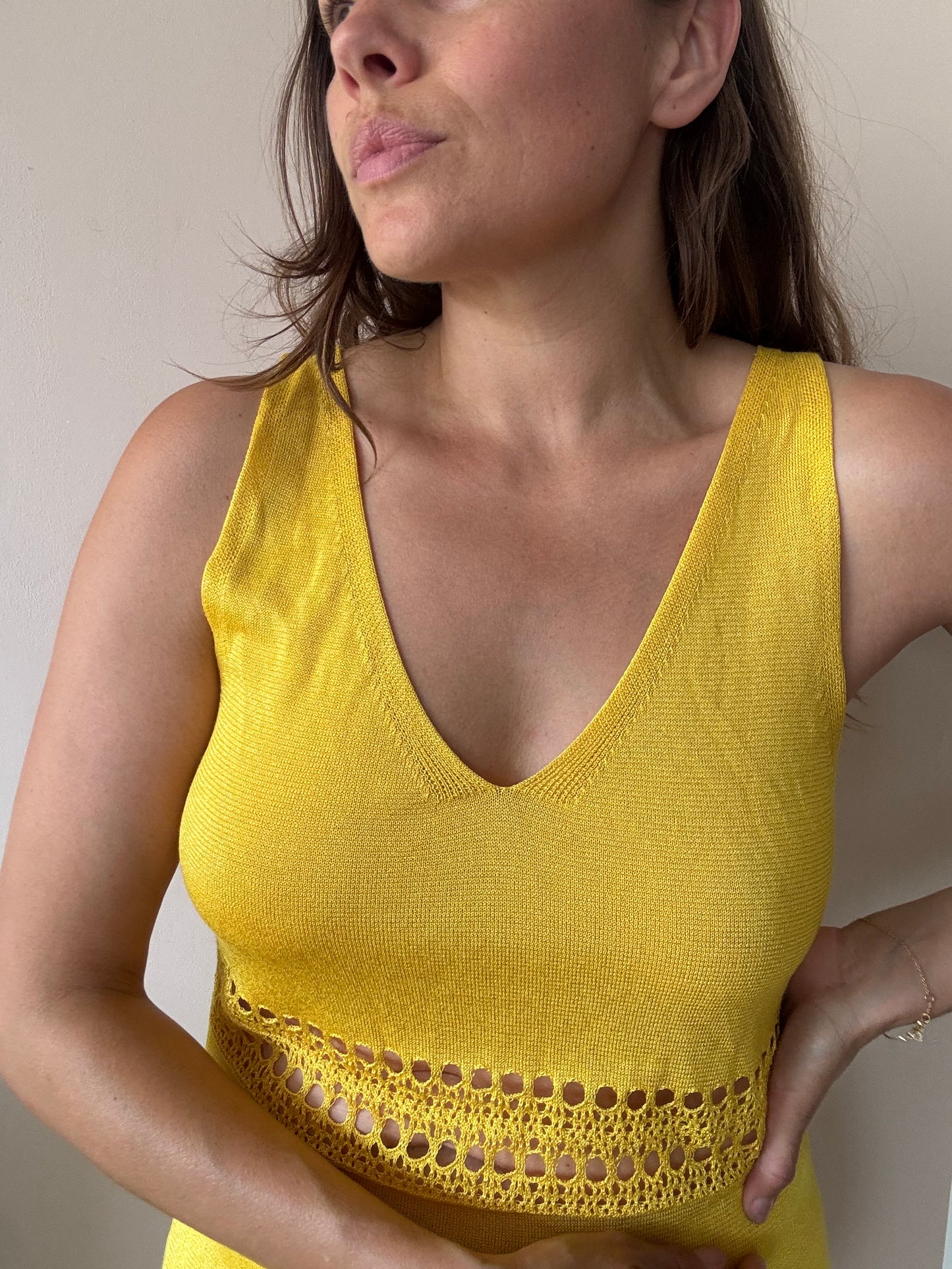 Yellow fine knit dress with cut out waist size Medium