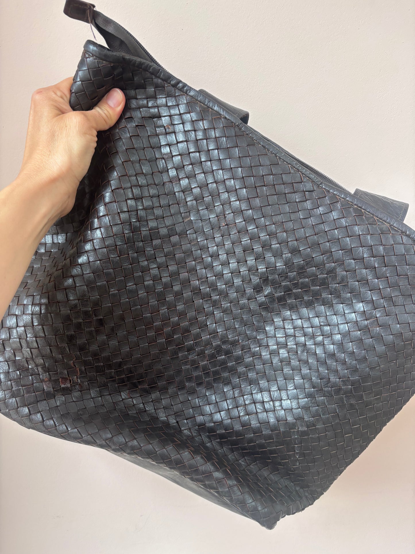 Dark brown woven leather bag