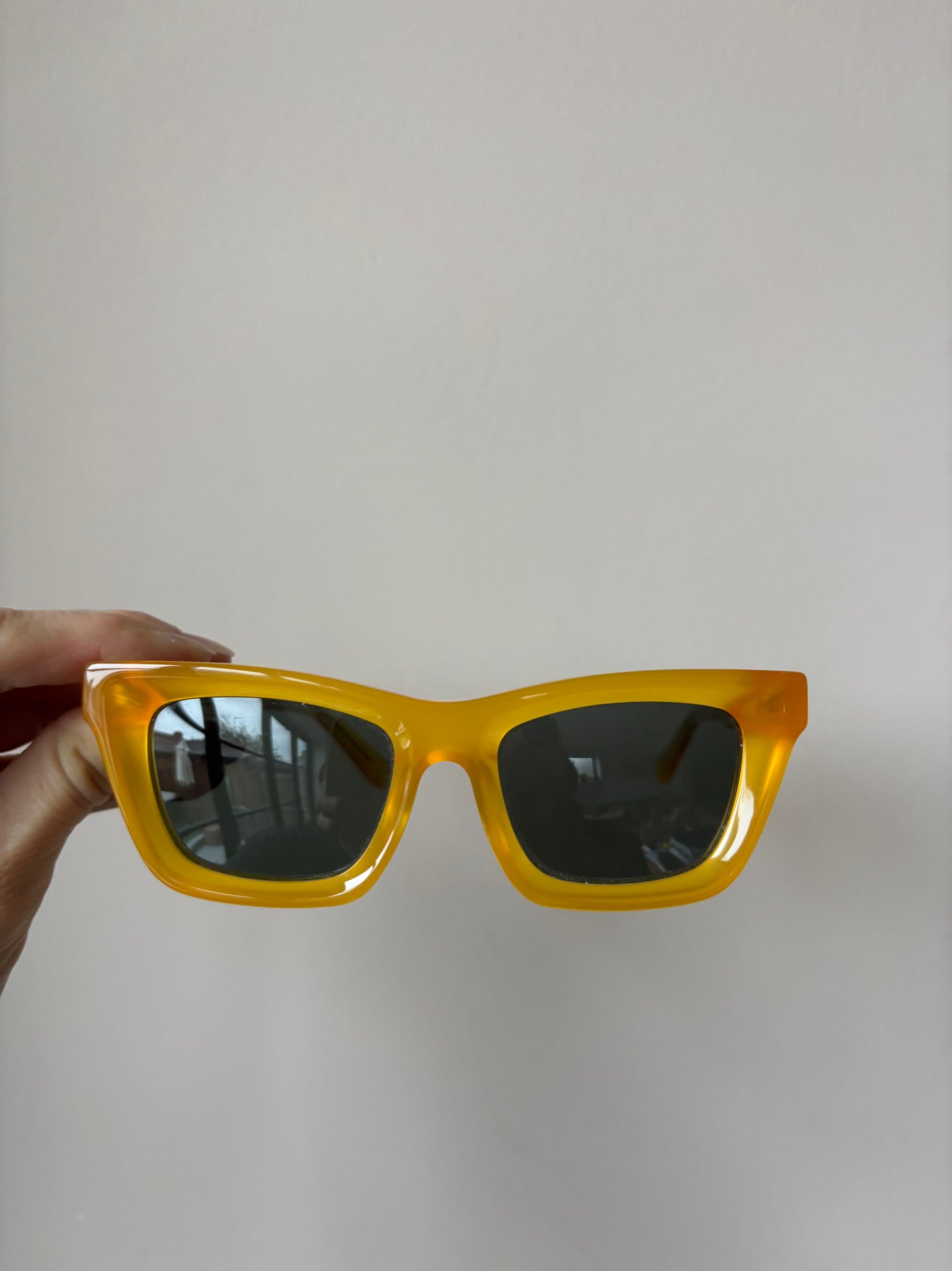 Yellow orange frame sunglasses