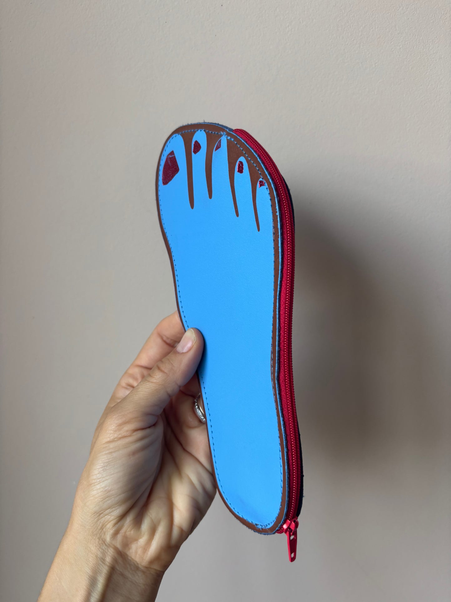 Ark leather face and foot purses