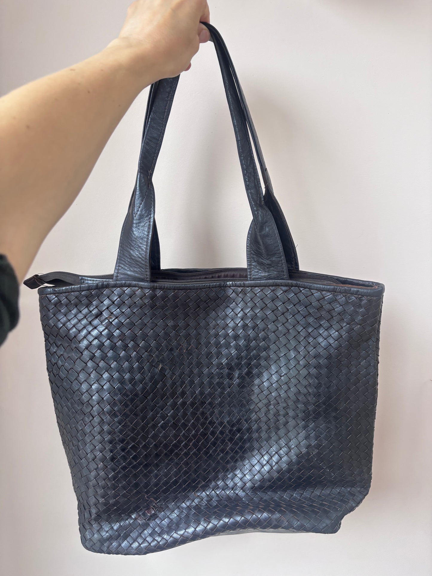 Dark brown woven leather bag