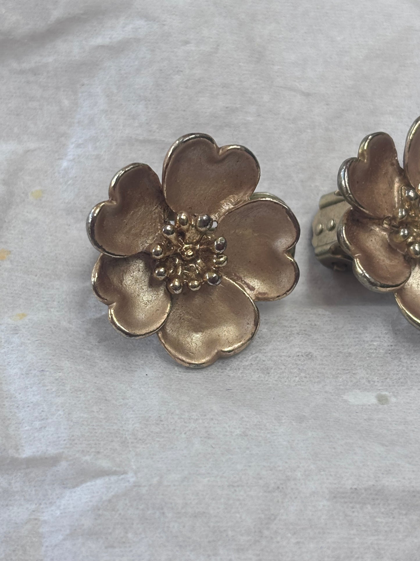 Gold flower clip on earrings