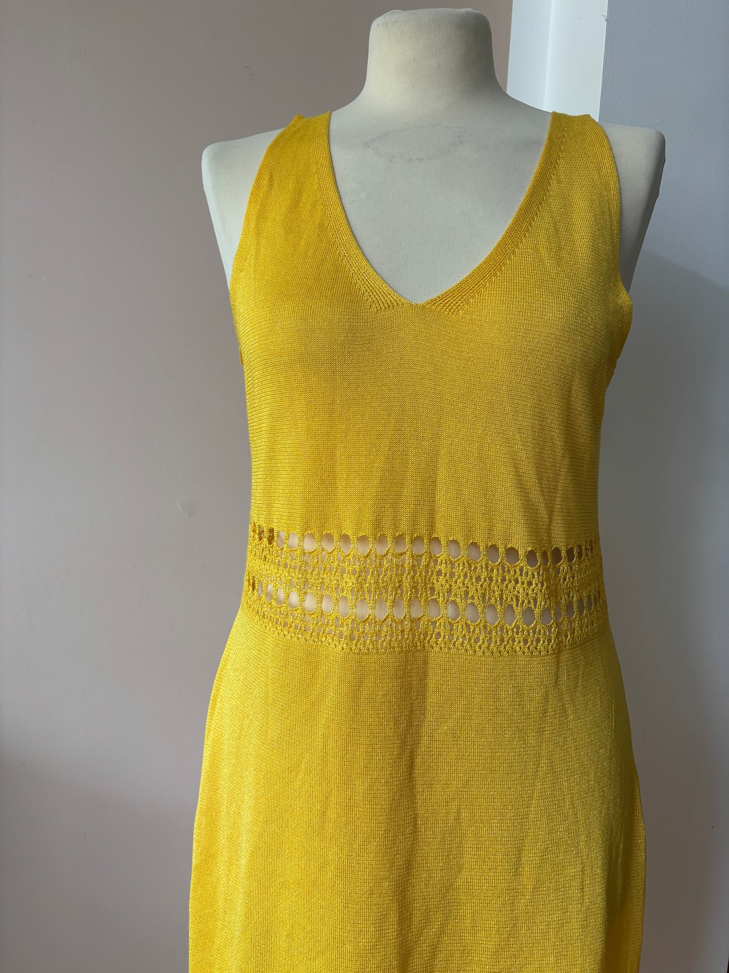 Yellow fine knit dress with cut out waist size Medium