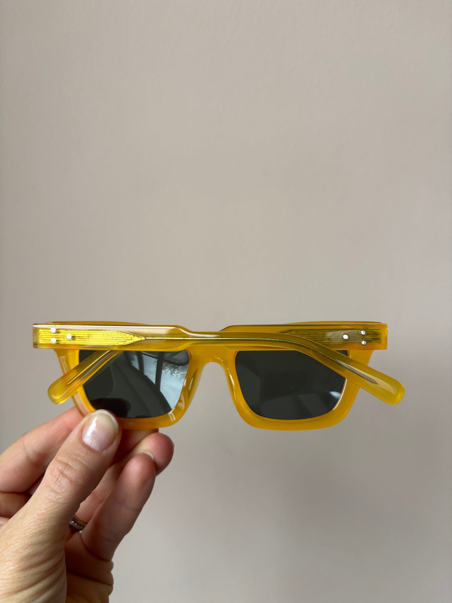 Yellow orange frame sunglasses