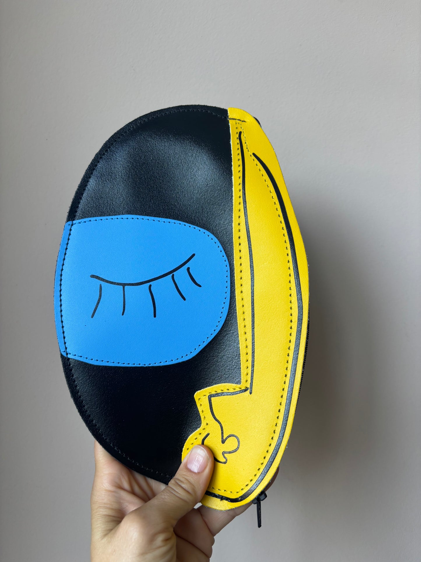 Ark leather face and foot purses