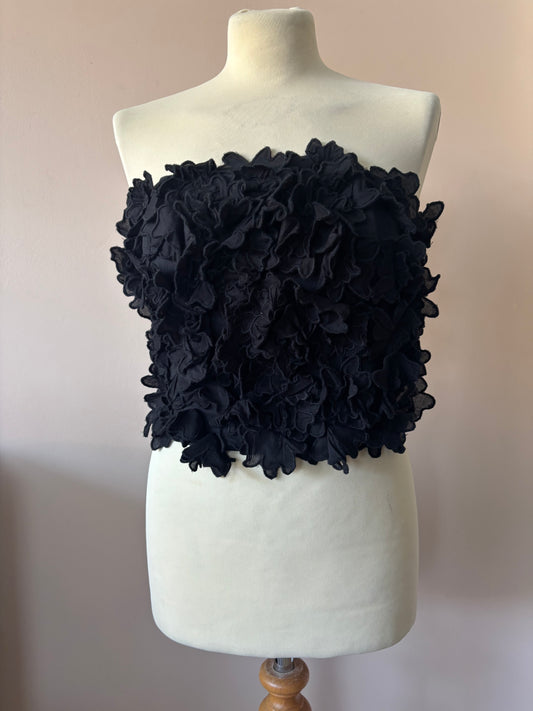 Black bandeau top with flower detailing size 10