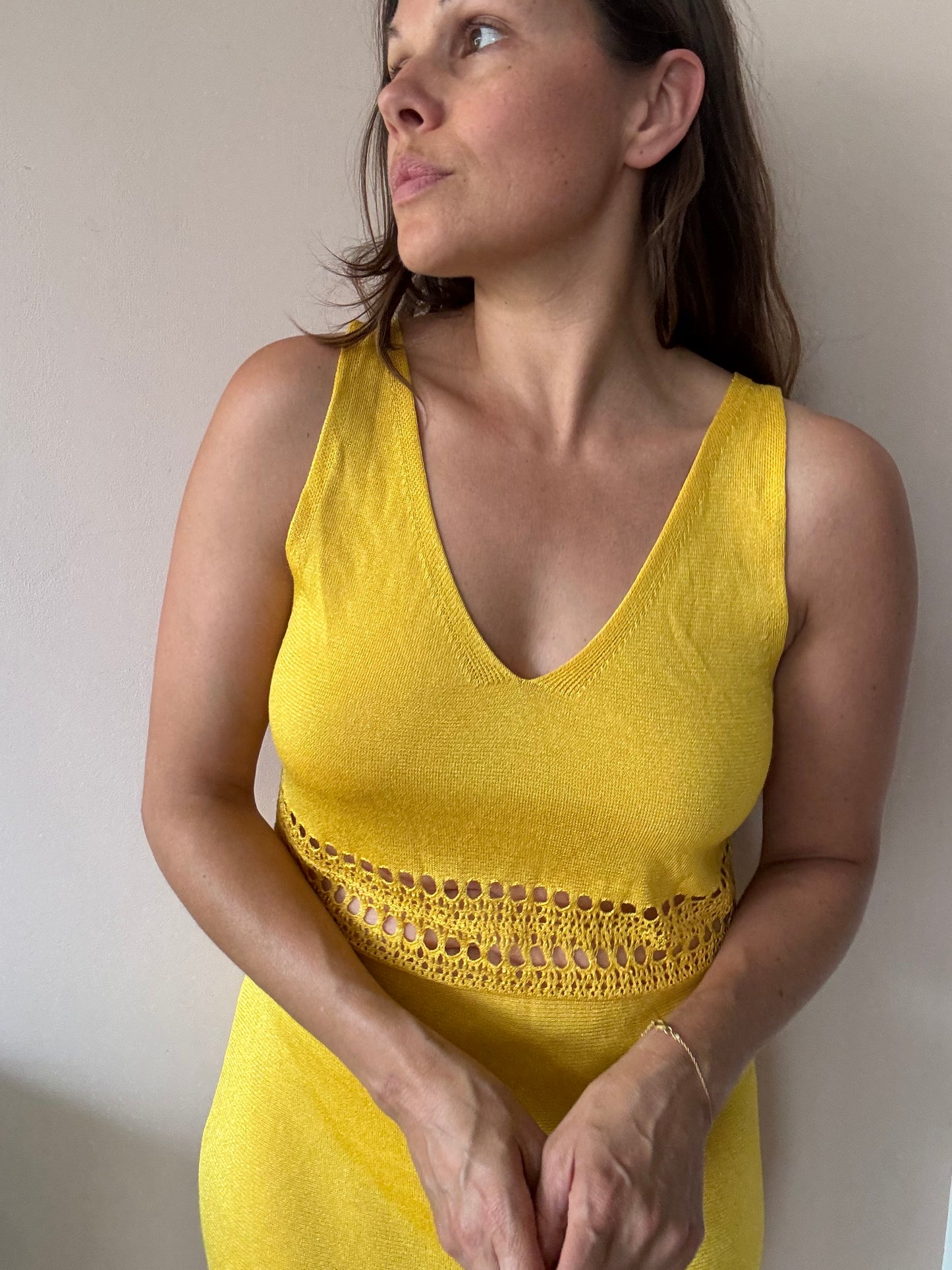 Yellow fine knit dress with cut out waist size Medium