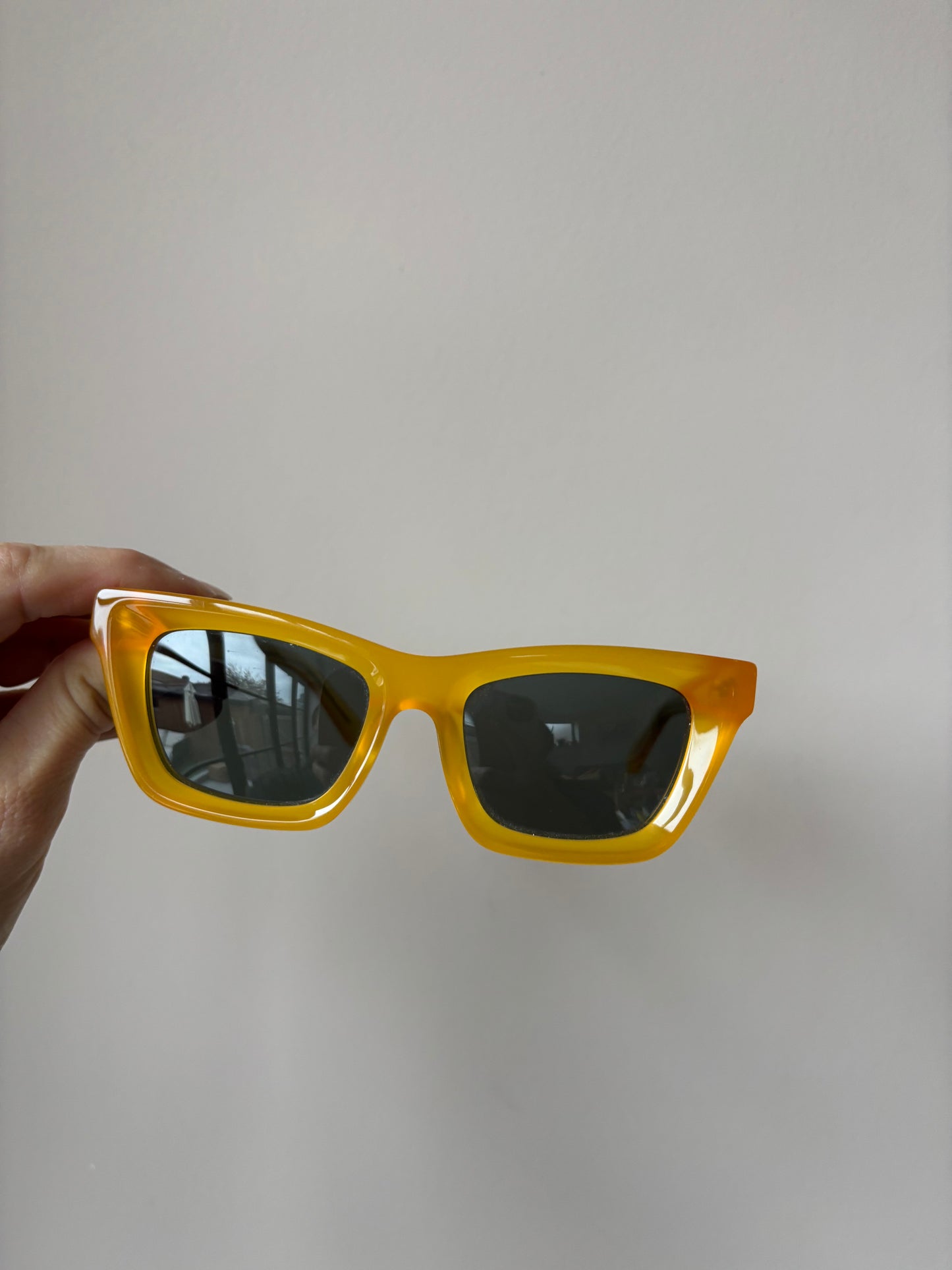 Yellow orange frame sunglasses