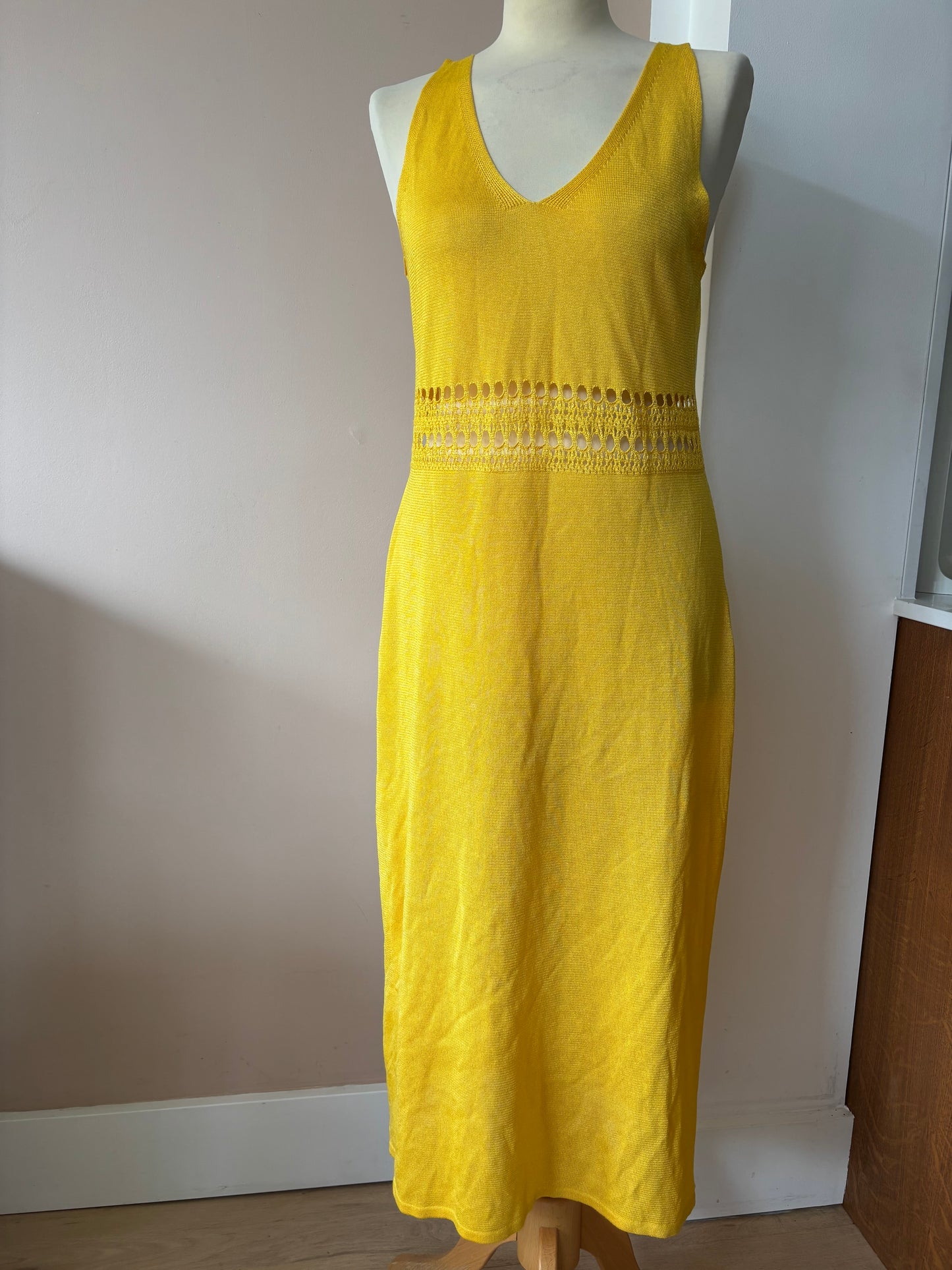 Yellow fine knit dress with cut out waist size Medium