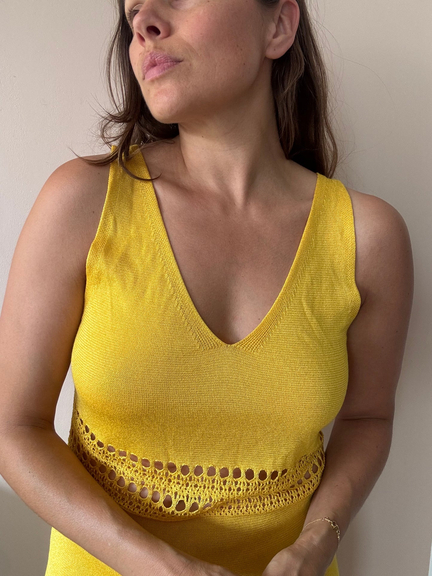 Yellow fine knit dress with cut out waist size Medium