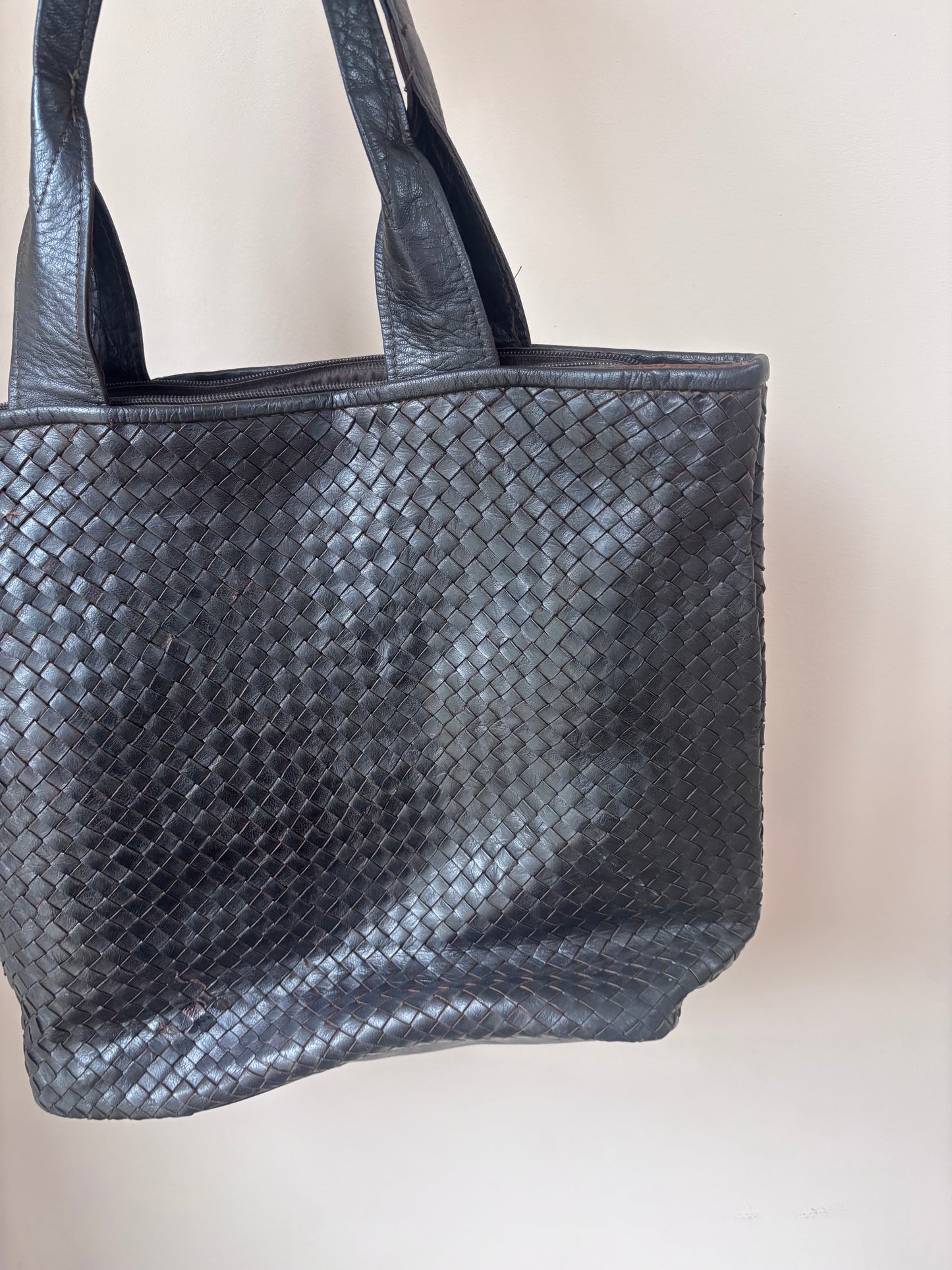 Dark brown woven leather bag