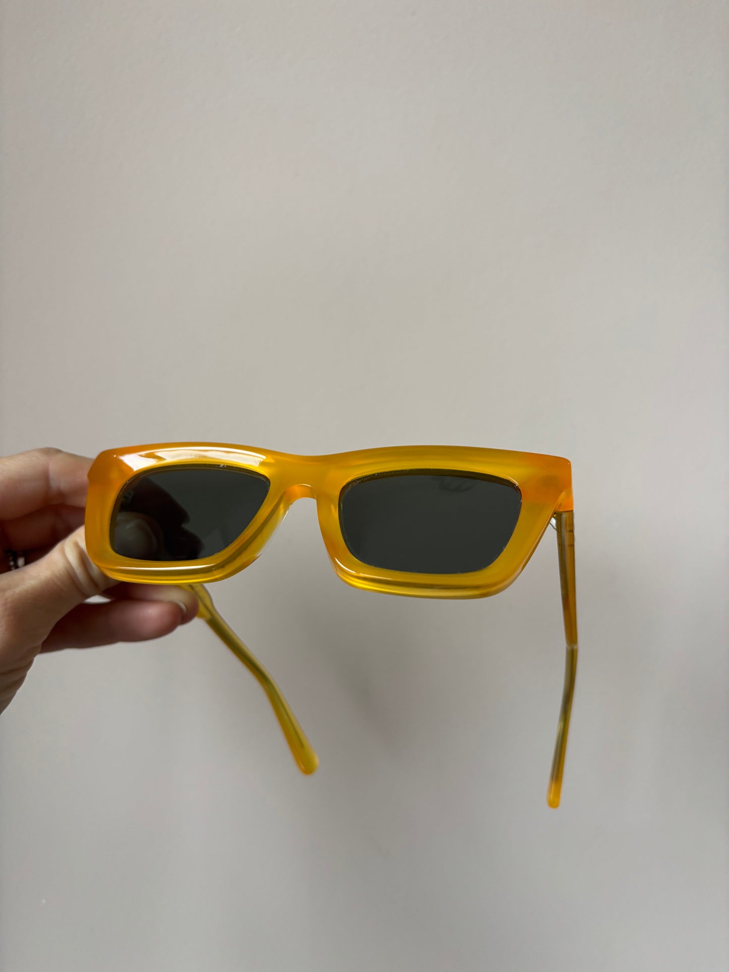 Yellow orange frame sunglasses
