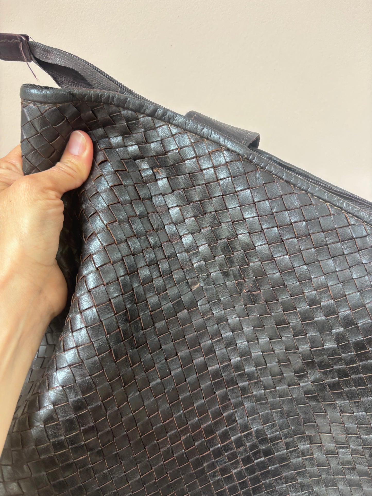 Dark brown woven leather bag