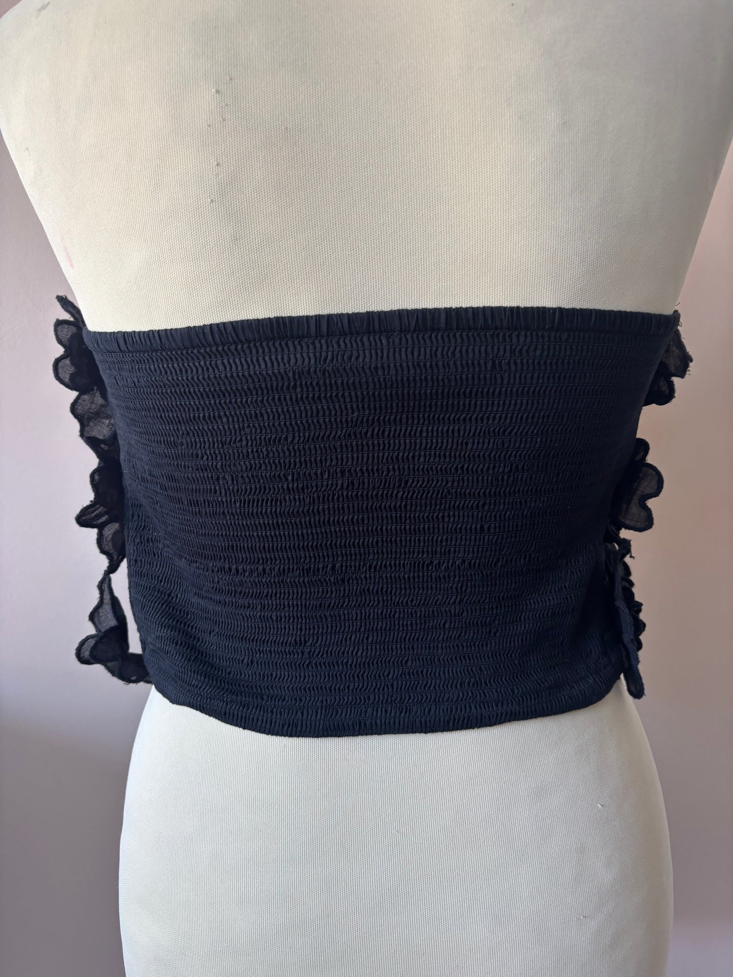 Black bandeau top with flower detailing size 10