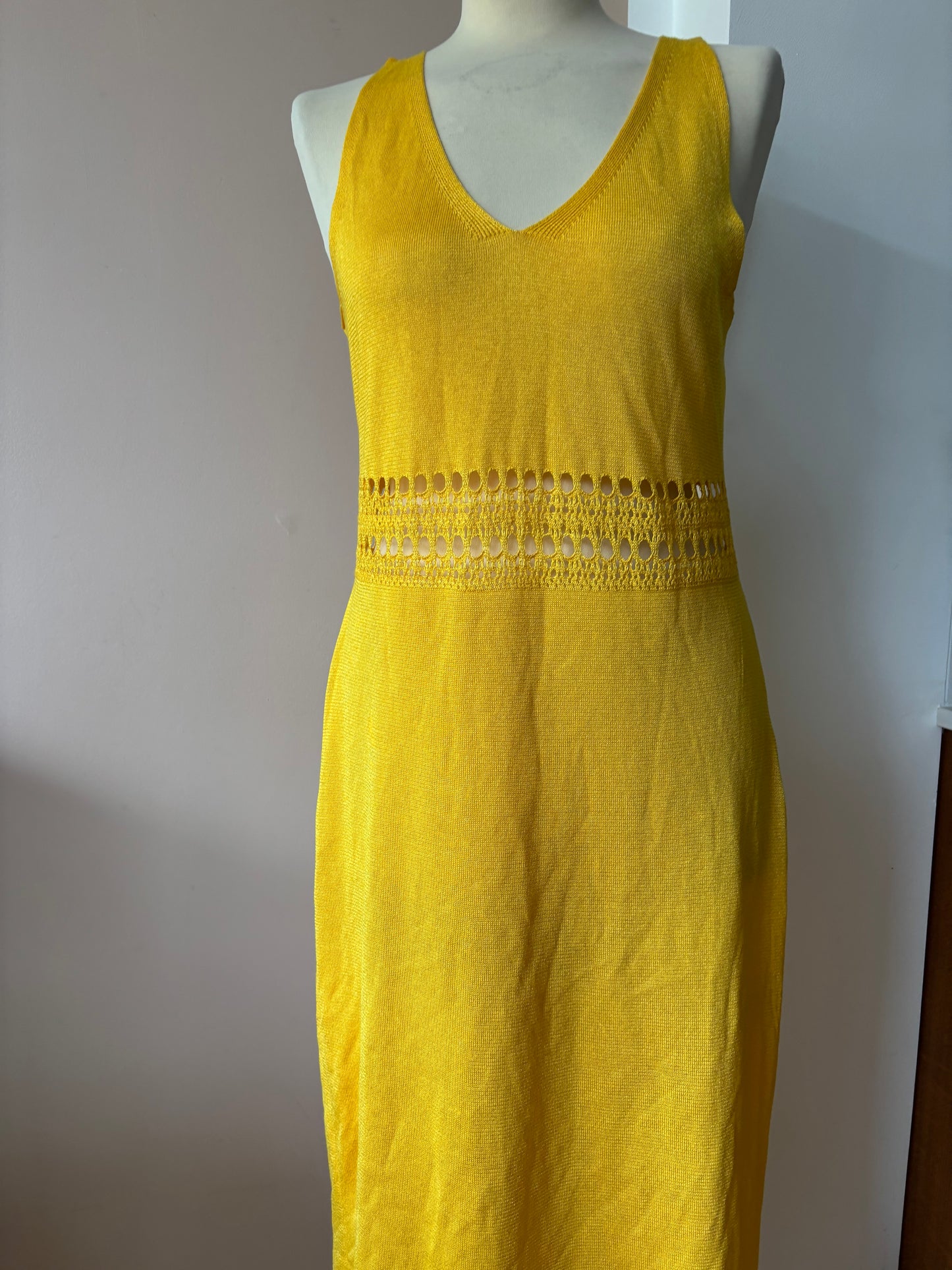 Yellow fine knit dress with cut out waist size Medium