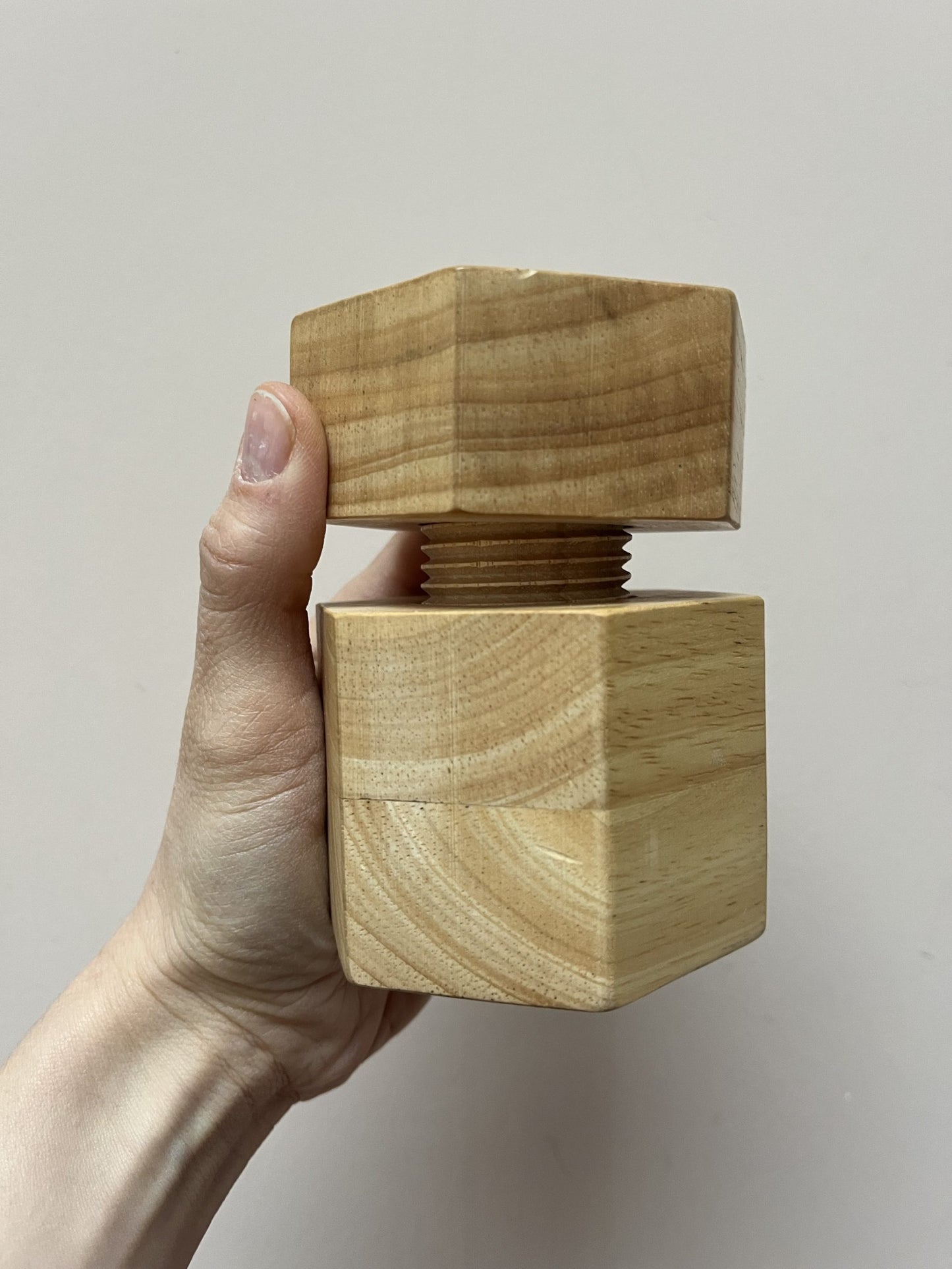 Wooden twist nut cracker