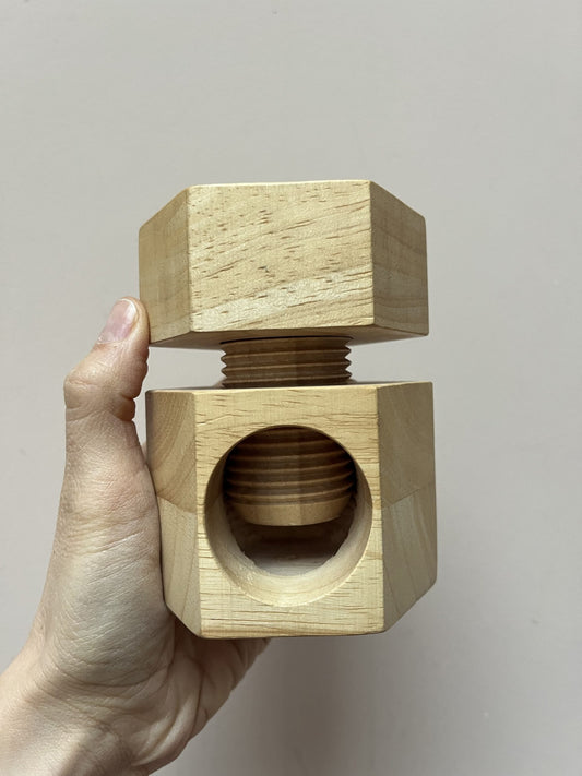 Wooden twist nut cracker