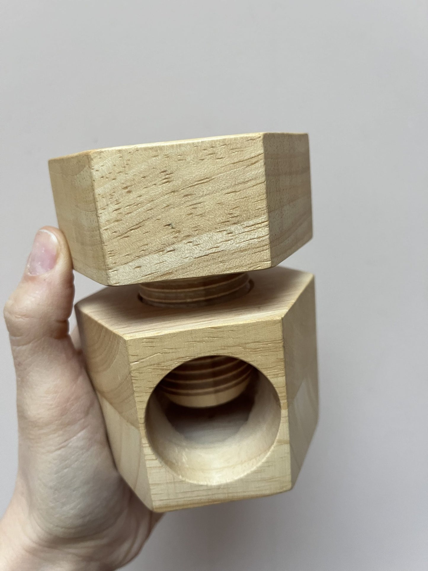 Wooden twist nut cracker
