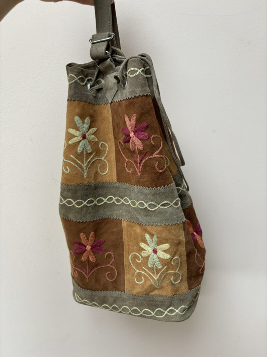 Suede embroidered floral bag