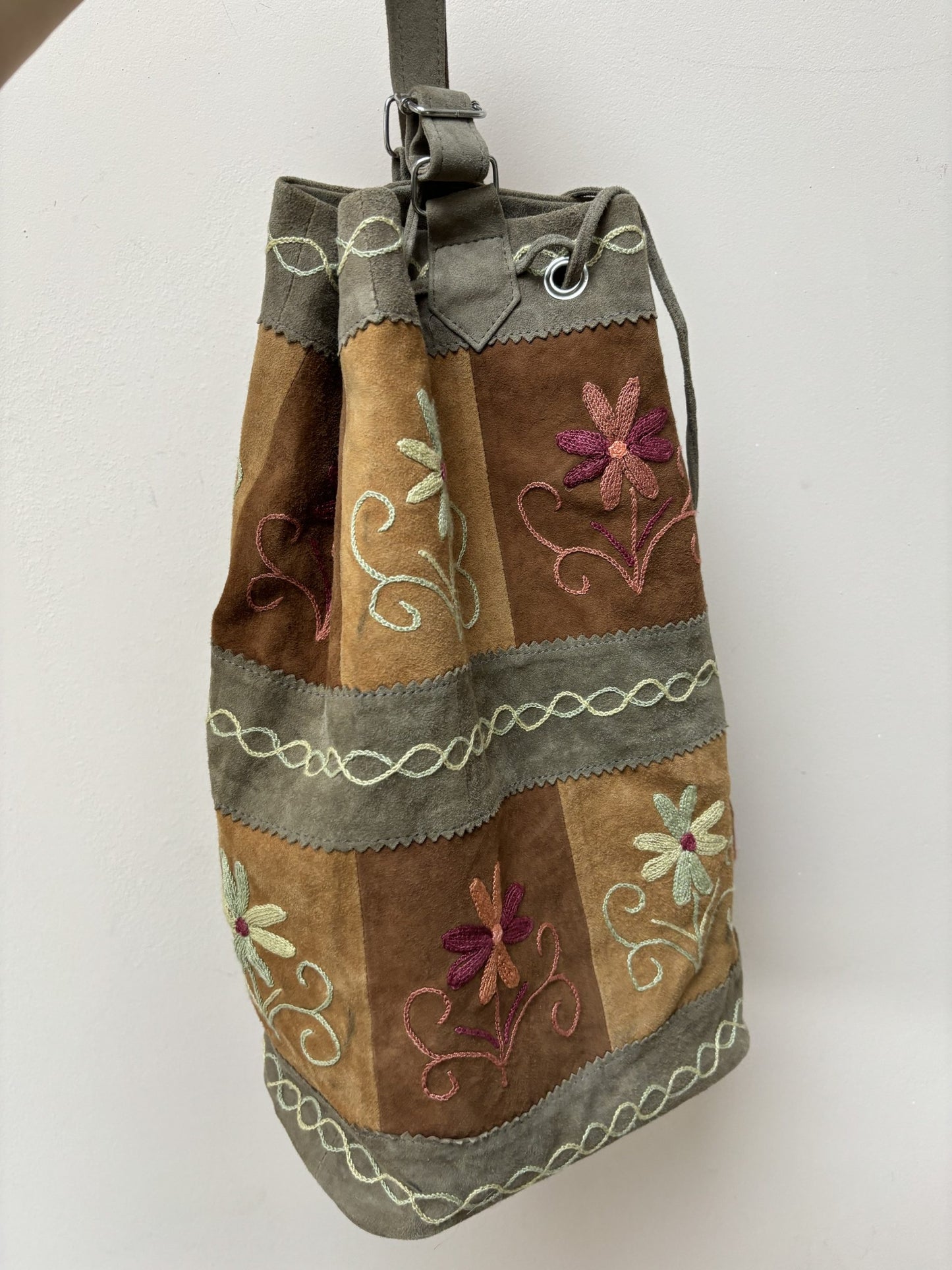 Suede embroidered floral bag