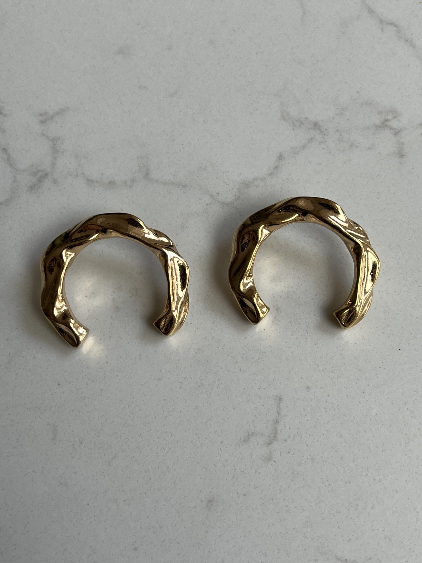 Gold horseshoe earrings