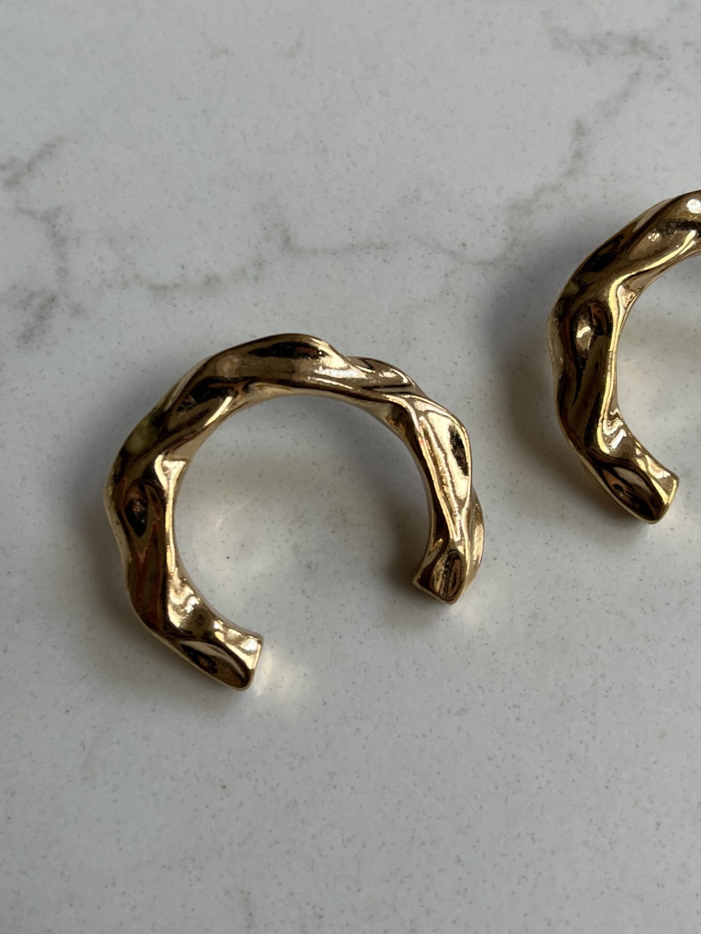 Gold horseshoe earrings