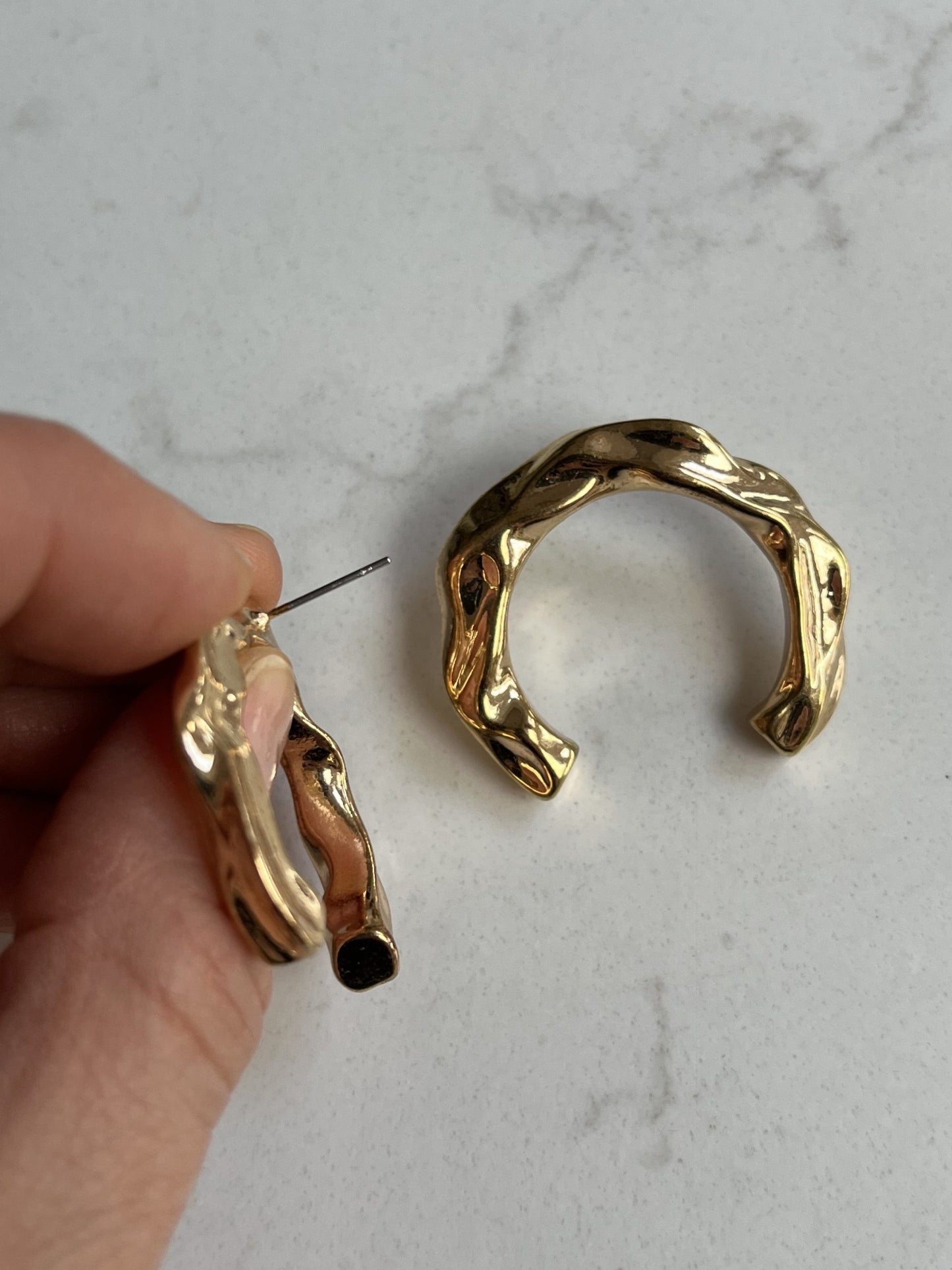 Gold horseshoe earrings