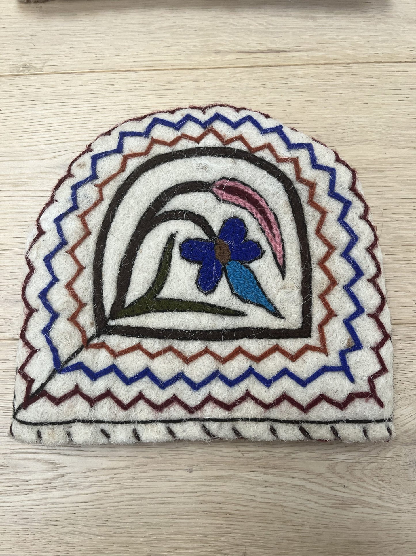 Embroidered tea cosy (one large one small)