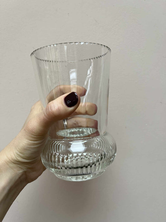 Glass vase with beautiful detailing around the rim and base