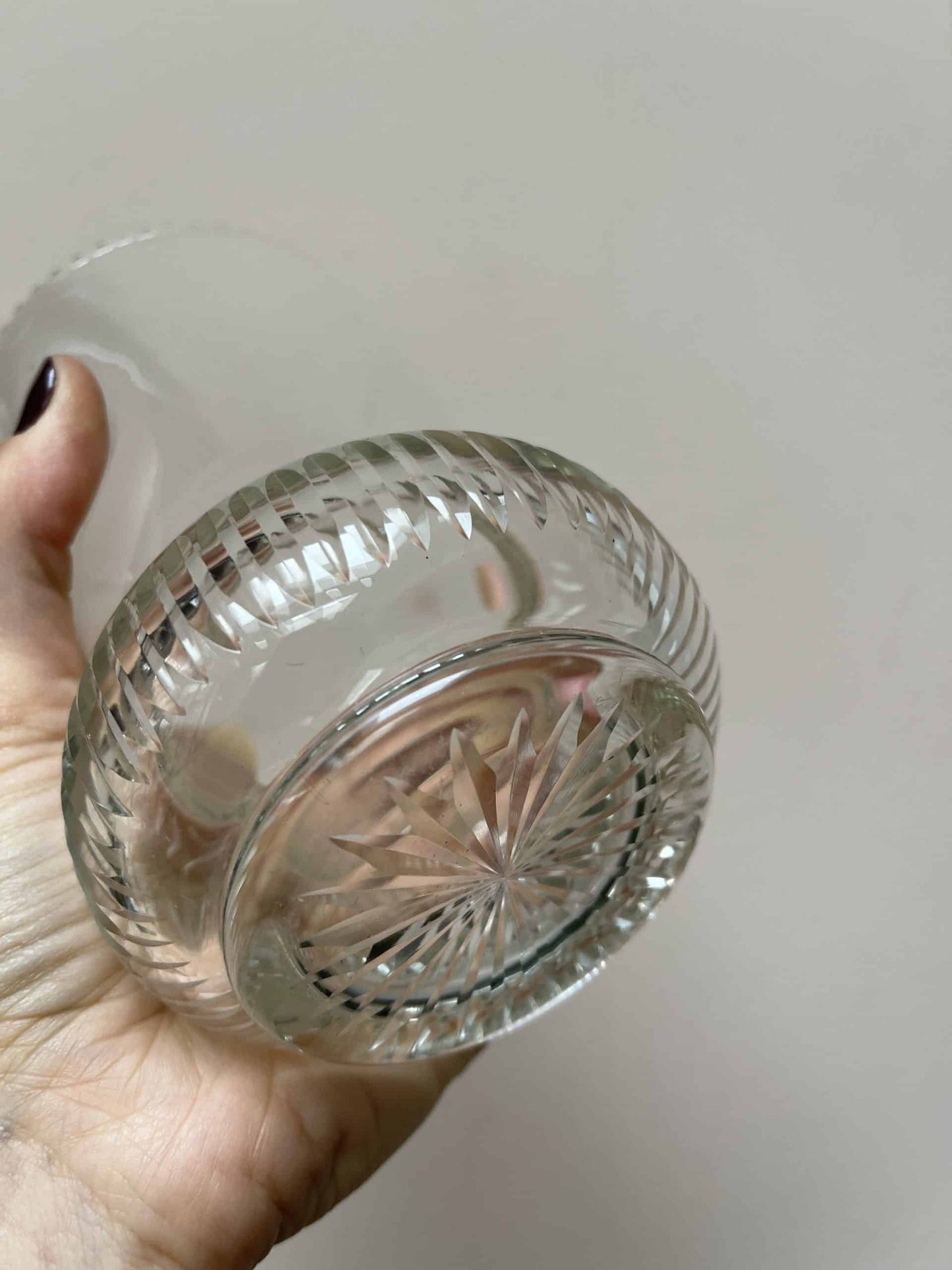 Glass vase with beautiful detailing around the rim and base