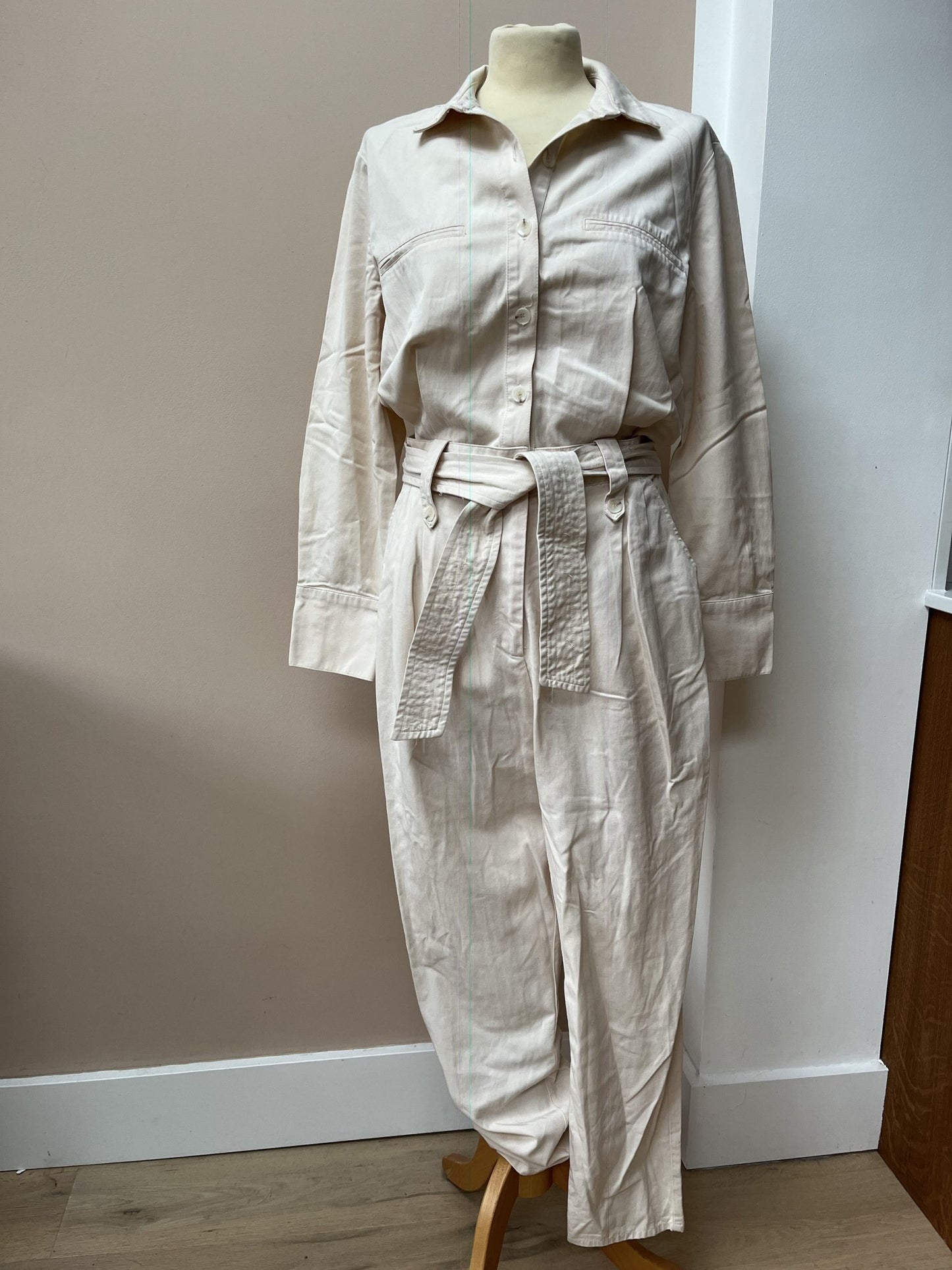Cream jumpsuit with tie waist size M