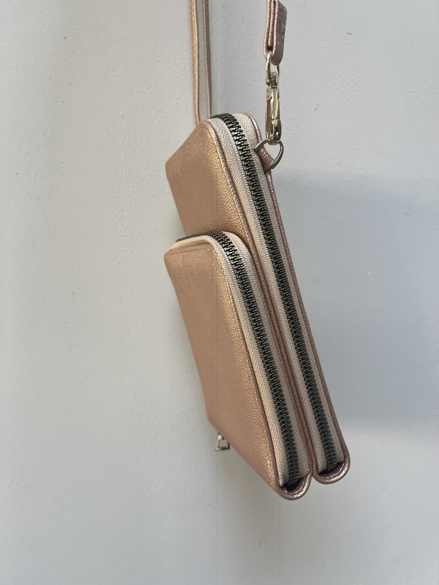 Rose gold cross body bag