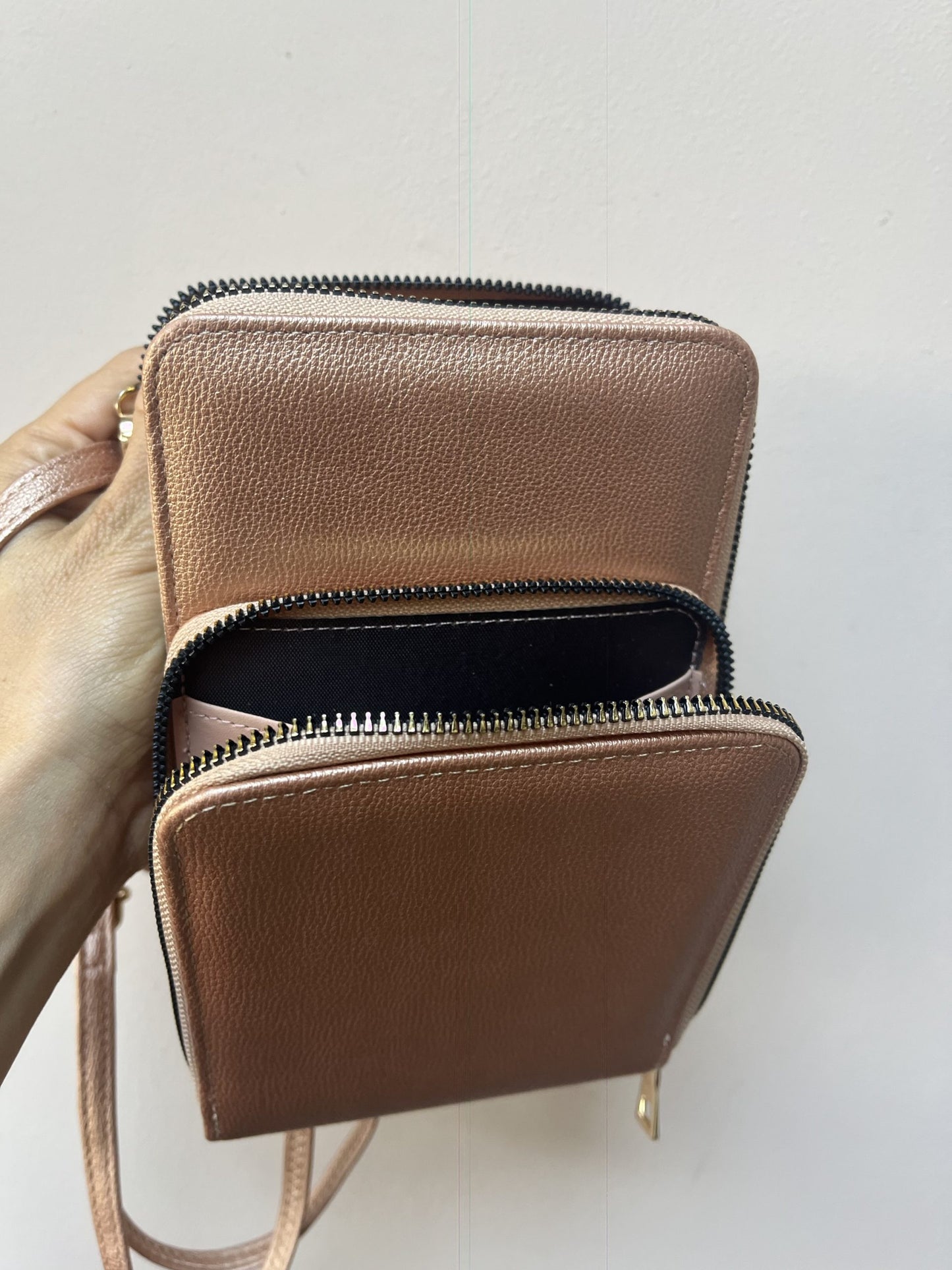 Rose gold cross body bag