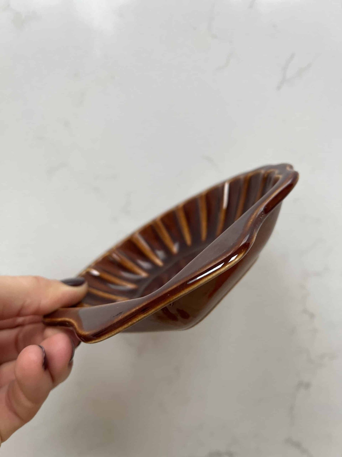 Brown ceramic shell bowl