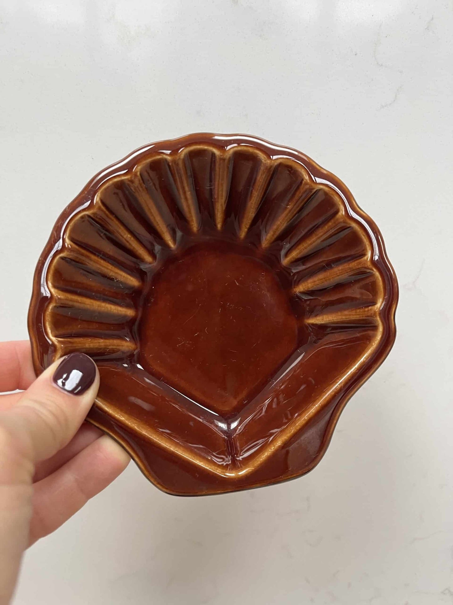 Brown ceramic shell bowl