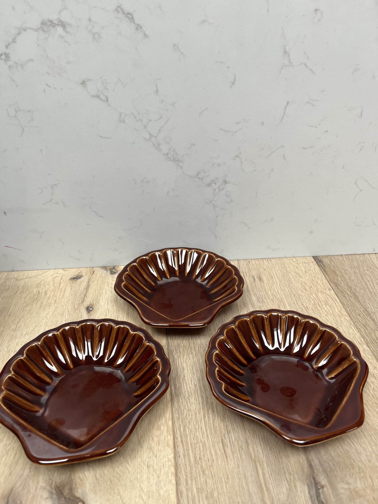 Brown ceramic shell bowl