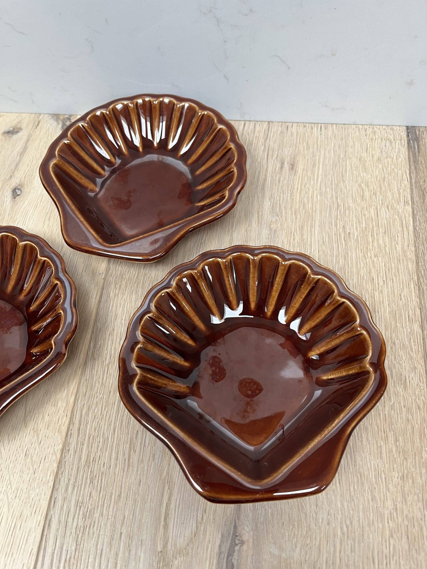 Brown ceramic shell bowl