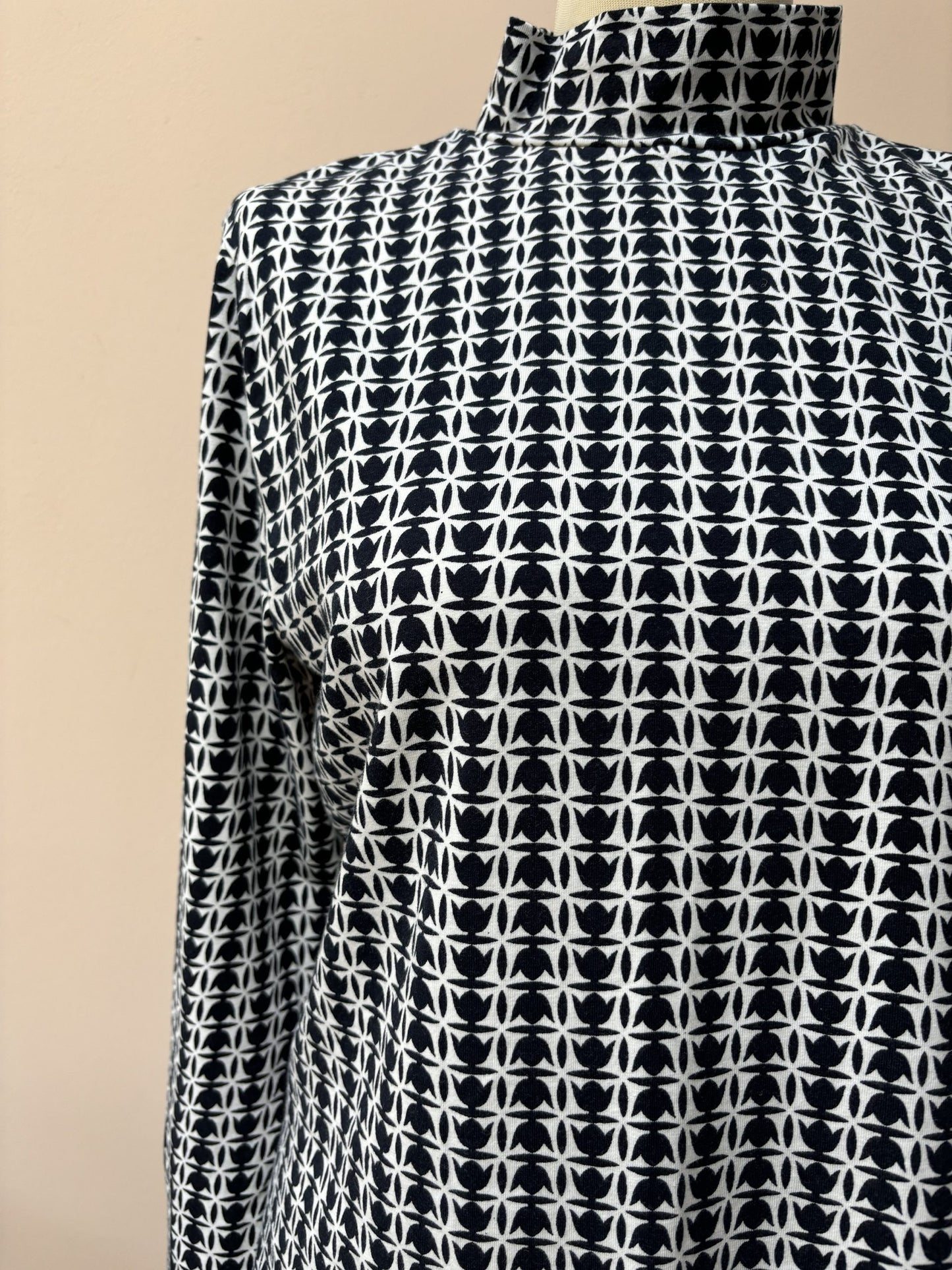 Cotton roll neck top size 14