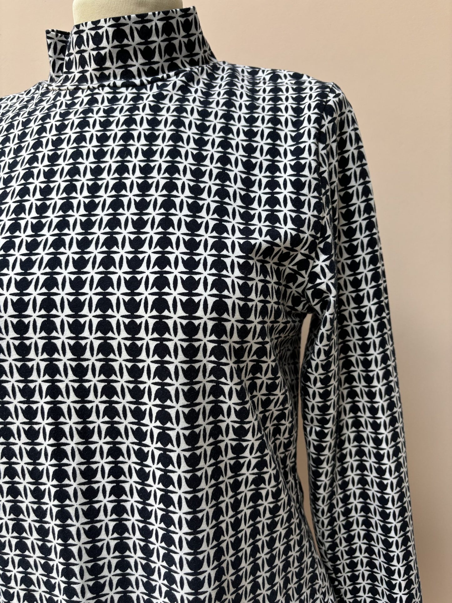 Cotton roll neck top size 14