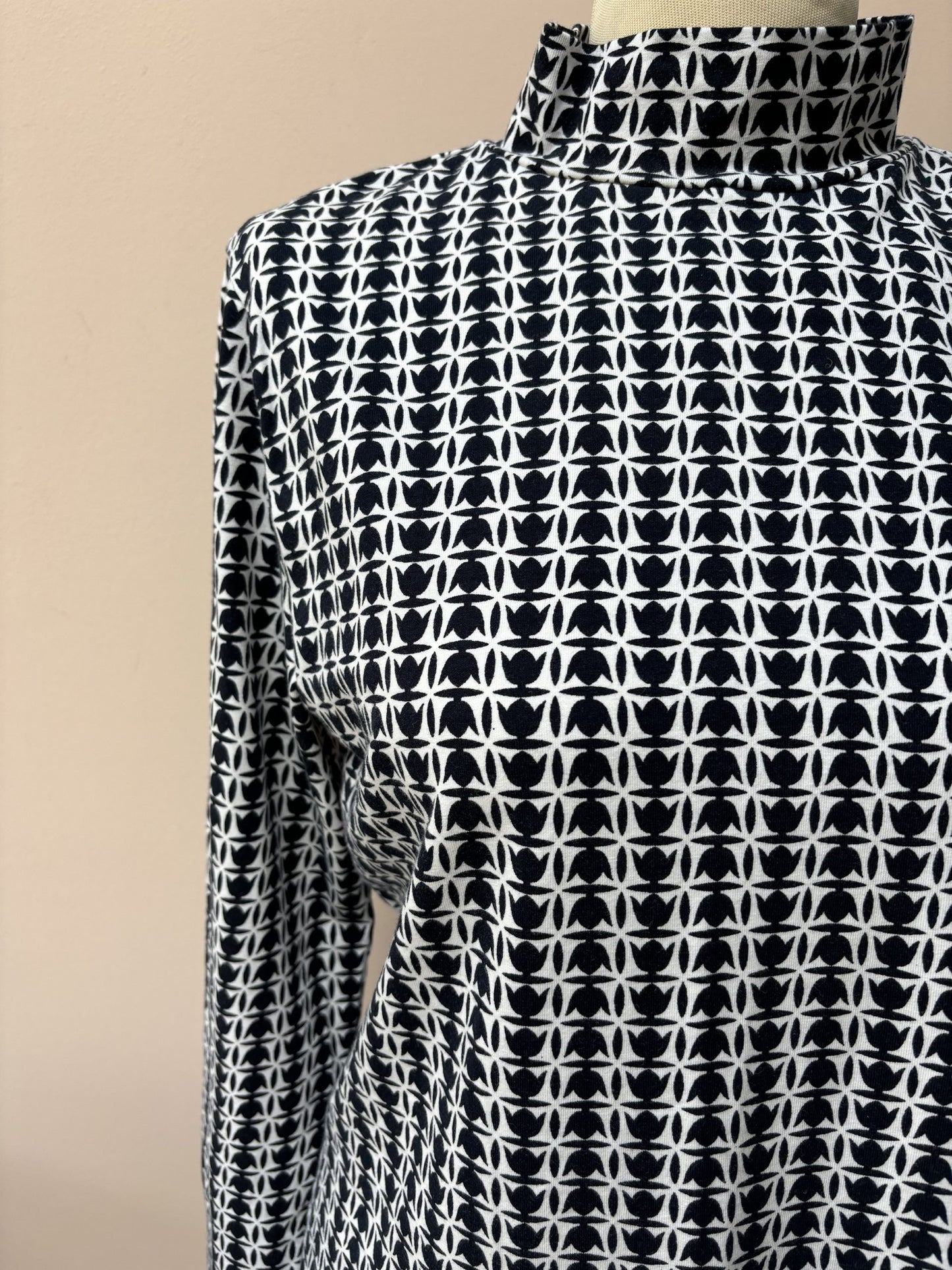 Cotton roll neck top size 14