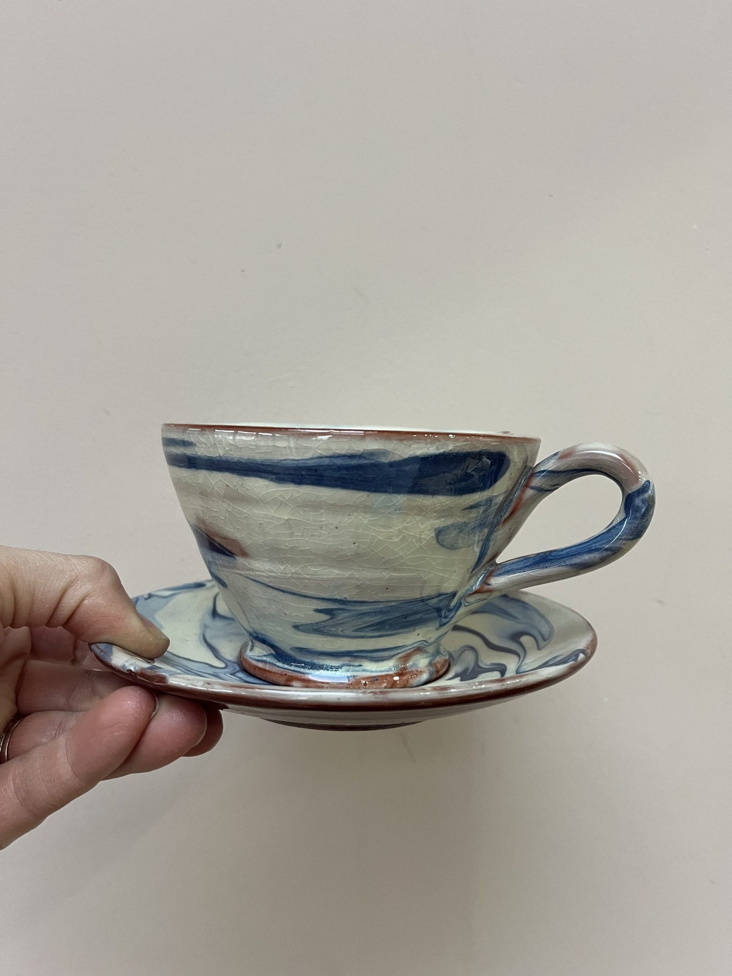 Blue cream marble swirl cup and saucer set